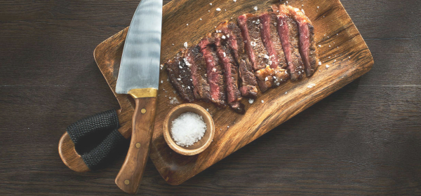 Roasted steak with knife image